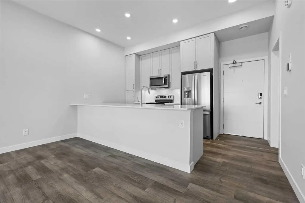 255 Les Jardins Park SE #406 — photo 2