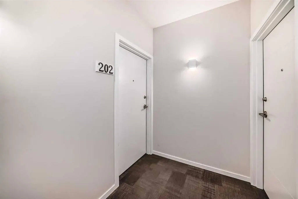 245 Redstone NE #202 — photo 3