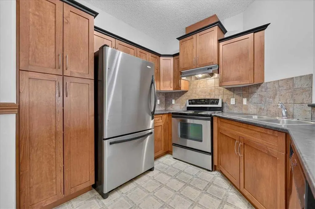 10 Discovery Ridge Close SW #537 — photo 2