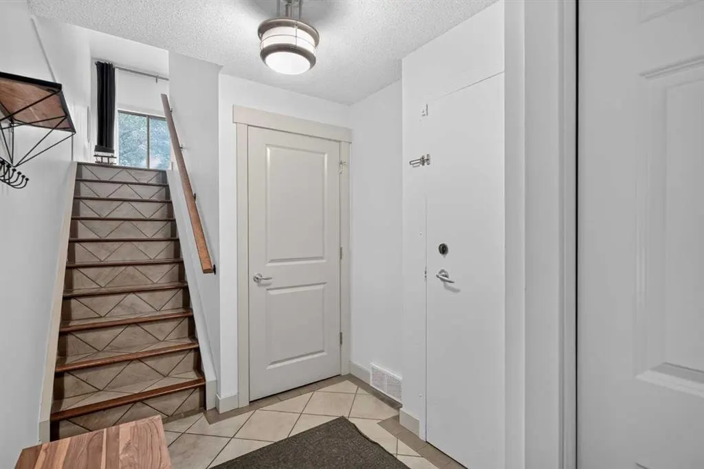 571 Point Mckay Grove NW — photo 2