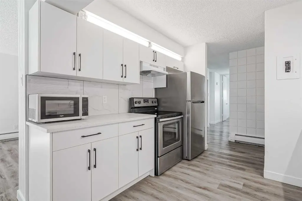 6919 Elbow Drive SW #113 — photo 1