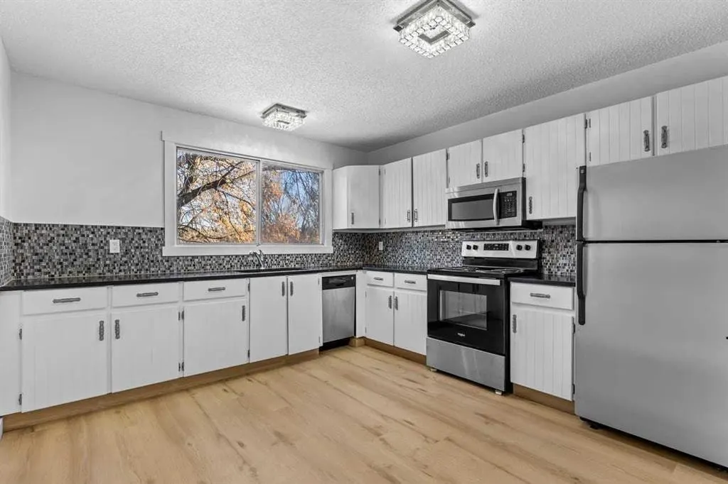 7006A Bowness Road NW — photo 1